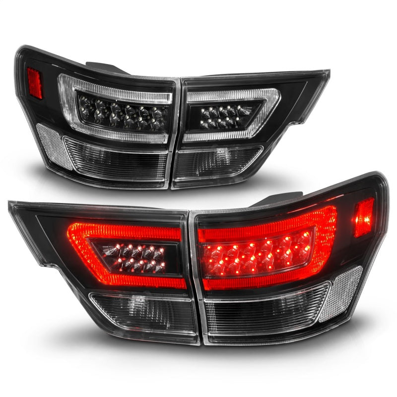 ANZO 11-13 Jeep Grand Cherokee LED Taillights w/ Lightbar Black Housing/Clear Lens 4pcs 311439