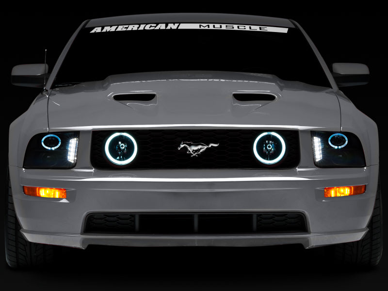 Raxiom 05-09 Ford Mustang w/ Halogen LED Halo Prjctr Headlights-Blk Hsng(Smoked Lens Exclude GT500) 49128