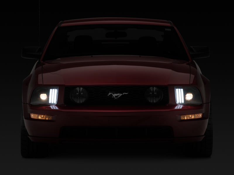 Raxiom 05-09 Ford Mustang w/ Halogen Prjctor Headlights- Black Housing (Clear Lens) (No GT500 )