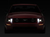 Raxiom 05-09 Ford Mustang w/ Halogen Prjctor Headlights- Black Housing (Clear Lens) (No GT500 )