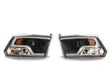 Raxiom 09-18 RAM 1500 LED Halo Projector Headlights- Black Housing (Clear Lens)