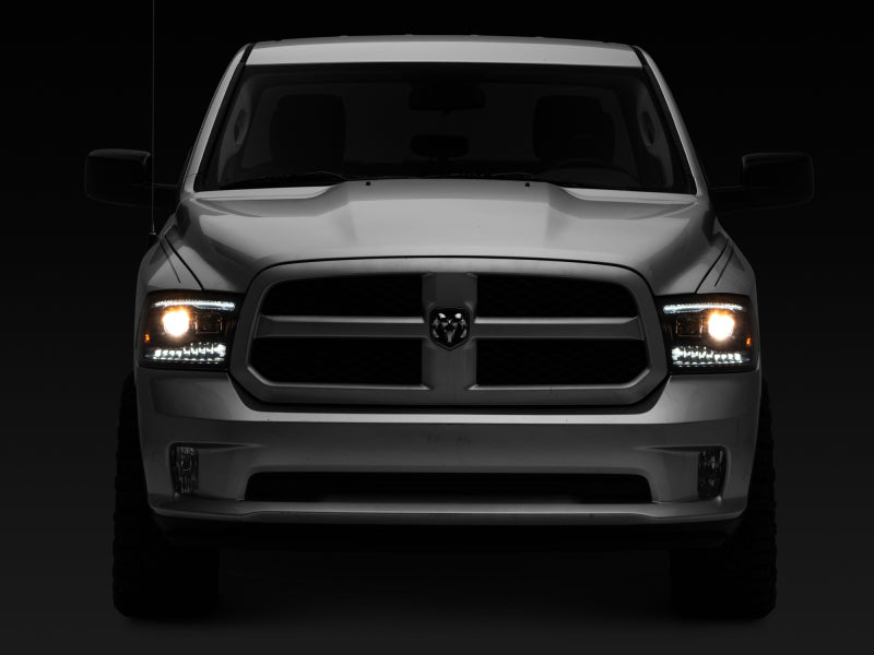 Raxiom 09-18 RAM 1500 LED Projector Headlights w/ Switchback Turn Signals- Blk Housing (Clear Lens)