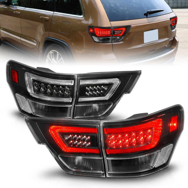 ANZO 11-13 Jeep Grand Cherokee LED Taillights w/ Lightbar Black Housing/Clear Lens 4pcs 311439