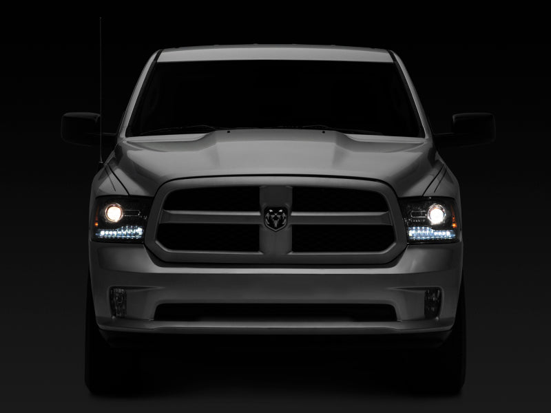 Raxiom 09-18 Dodge RAM 1500 LED Halo Headlights w/Switchback Turn Signals- Blk Housing (Clear Lens)