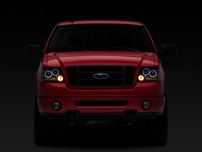 Raxiom 04-08 Ford F-150 Dual LED Halo Projector Headlights- Black Housing (Clear Lens)