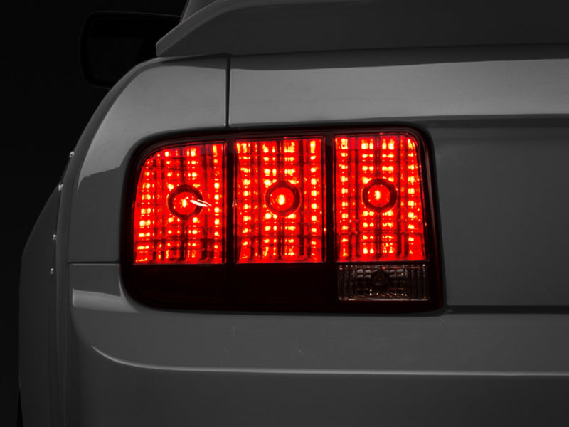 Raxiom 05-09 Ford Mustang Tail Lights- Black Housing (Smoked Lens) 49066