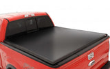 Lund 04-14 Ford F-150 (5.5ft. Bed) Genesis Tri-Fold Tonneau Cover - Black 95072