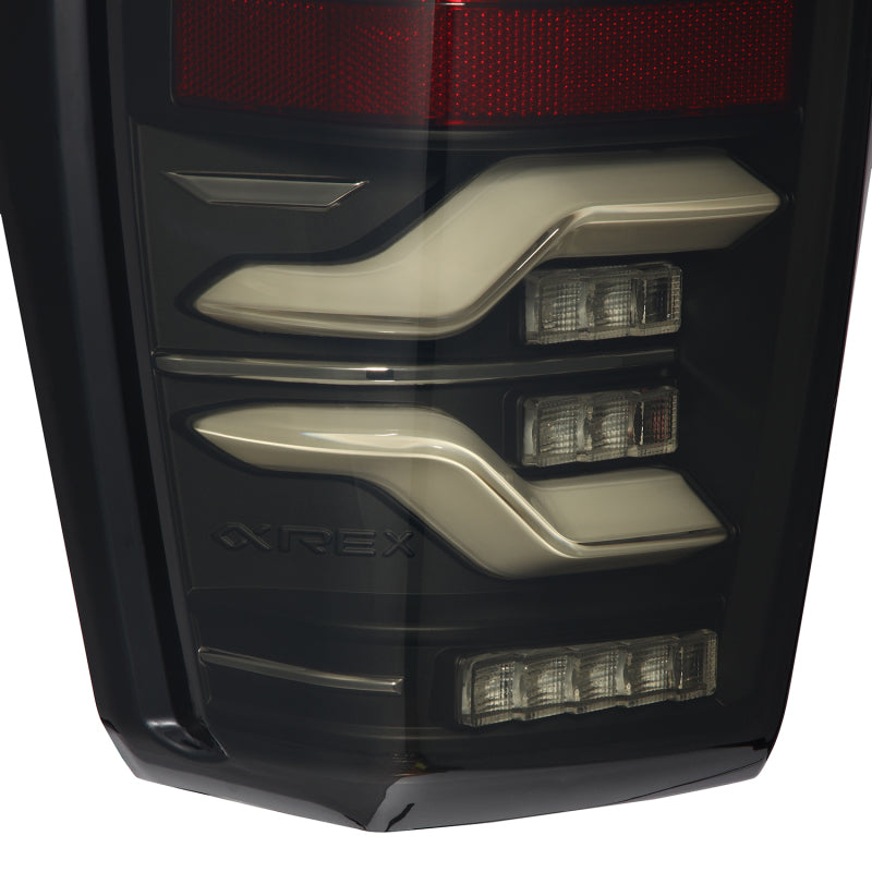 AlphaRex 16-21 Toyota TacomaLUXX LED Taillights Blk w/Activ Light/Seq Signal 680090