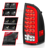 ANZO 05-15 Toyota Tacoma Full LED Tail Lights w/Light Bar Sequential Black Housing Clear Lens 311427