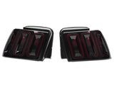 Raxiom 99-04 Ford Mustang Excluding 99-01 Cobra Icon LED Tail Lights- Black Housing (Smoked Lens) 100807