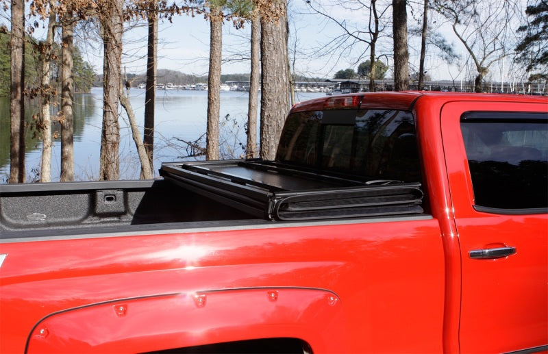 Lund 05-17 Nissan Frontier Styleside (5ft. Bed) Hard Fold Tonneau Cover - Black 969452