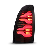 AlphaRex 05-15 Toyota Tacoma LUXX LED Taillights Blk/Red w/Activ Light/Seq Signal 680070