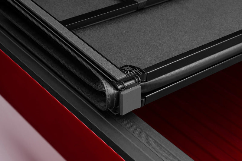 Lund 05-17 Nissan Frontier Styleside (5ft. Bed) Hard Fold Tonneau Cover - Black 969452