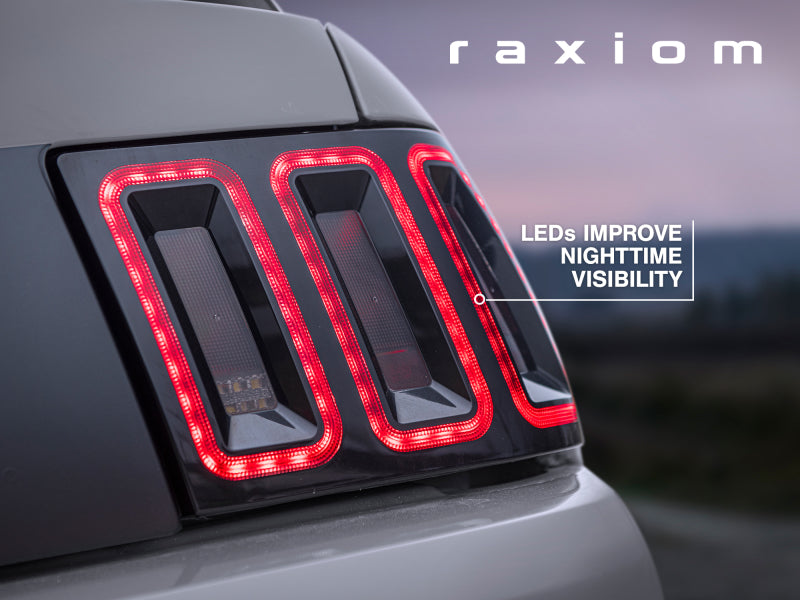 Raxiom 99-04 Ford Mustang Excluding 99-01 Cobra Icon LED Tail Lights- Black Housing (Smoked Lens) 100807