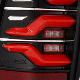 AlphaRex 05-15 Toyota Tacoma LUXX LED Taillights Blk/Red w/Activ Light/Seq Signal 680070