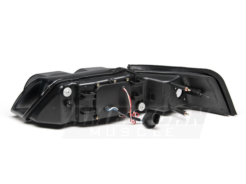 Raxiom 99-04 Ford Mustang Dual LED Halo Projector Headlights- Black Housing (Smoked Lens) 49113