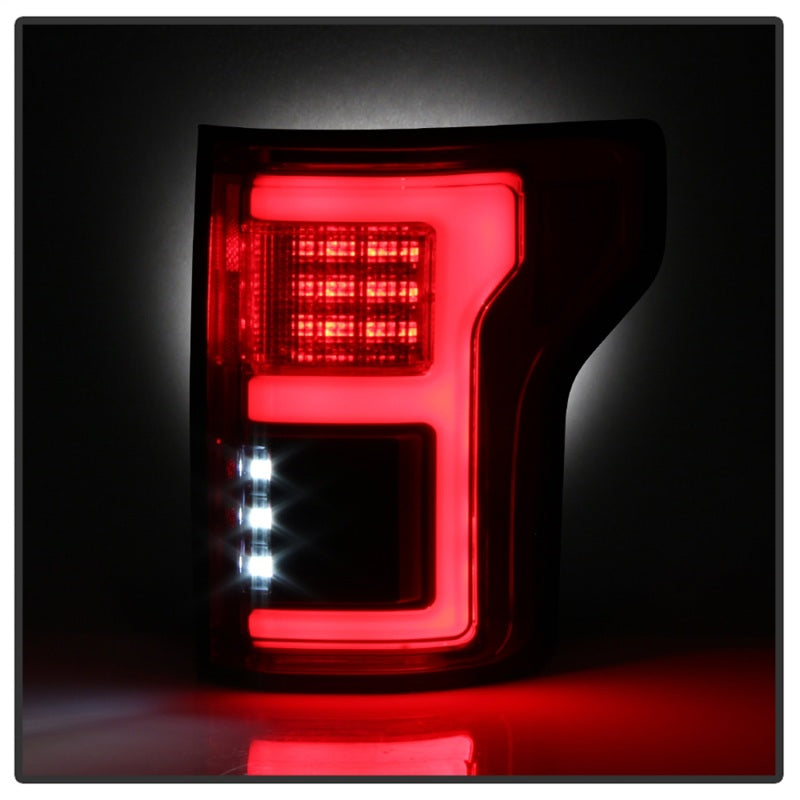 Spyder 15-18 Ford F-150 LED Tail Lights (w/Blind Spot) - Red Clear (ALT-YD-FF15015BS-LBLED-RC) 5085320